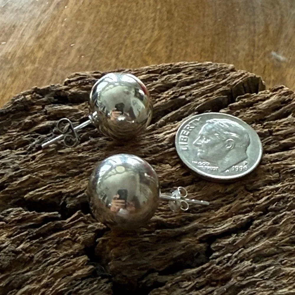 Unmarked sterling silver earrings